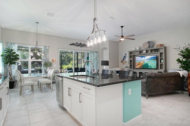 Beautifully appointed 2/2/2 home with a large den that can on Meadowood Golf and Tennis Club in Florida - for sale on GolfHomes.com, golf home, golf lot
