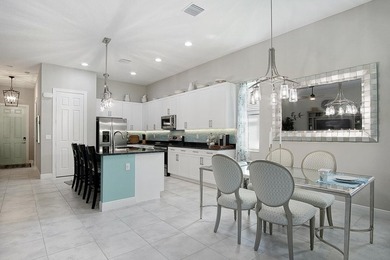 Beautifully appointed 2/2/2 home with a large den that can on Meadowood Golf and Tennis Club in Florida - for sale on GolfHomes.com, golf home, golf lot