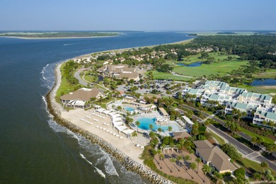 A thoughtfully renovated two-level villa with elevated living on The Seabrook Island Club in South Carolina - for sale on GolfHomes.com, golf home, golf lot