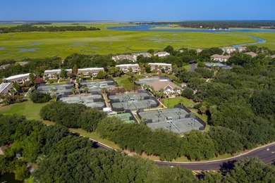 A thoughtfully renovated two-level villa with elevated living on The Seabrook Island Club in South Carolina - for sale on GolfHomes.com, golf home, golf lot