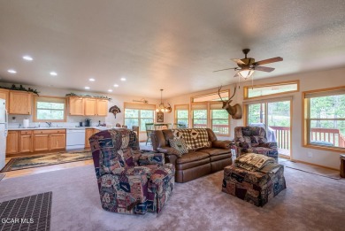 This turnkey furnished 3bd/2bath Ranch sits on a full third acre on Grand Lake Golf Course in Colorado - for sale on GolfHomes.com, golf home, golf lot