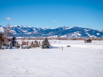 This prime building site in Teton Reserve offers breathtaking on Teton Reserve in Idaho - for sale on GolfHomes.com, golf home, golf lot