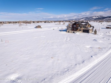 This prime building site in Teton Reserve offers breathtaking on Teton Reserve in Idaho - for sale on GolfHomes.com, golf home, golf lot