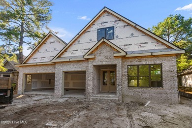 Situated within the private, award-winning Thistle Golf Club in on Thistle Golf Club in North Carolina - for sale on GolfHomes.com, golf home, golf lot