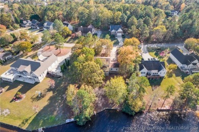 This charming waterfront home on Carolina Lake is the perfect on Carolina Lakes Country Club in North Carolina - for sale on GolfHomes.com, golf home, golf lot