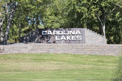 This charming waterfront home on Carolina Lake is the perfect on Carolina Lakes Country Club in North Carolina - for sale on GolfHomes.com, golf home, golf lot