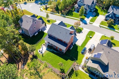 Welcome to MAGNOLIA GREEN! This 4-5 bedroom custom home (former on The Westham Golf Club At Magnolia Green in Virginia - for sale on GolfHomes.com, golf home, golf lot