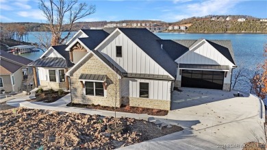 Welcome to this new construction home in Porto Cima @ Lake of on The Club At Porto Cima in Missouri - for sale on GolfHomes.com, golf home, golf lot