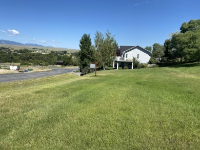 Set in a picturesque location, this lot offers elevated views of on The Powder Horn Golf Club - Mountain in Wyoming - for sale on GolfHomes.com, golf home, golf lot