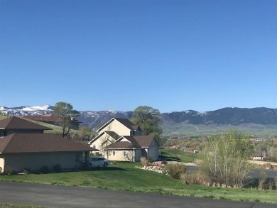 Set in a picturesque location, this lot offers elevated views of on The Powder Horn Golf Club - Mountain in Wyoming - for sale on GolfHomes.com, golf home, golf lot