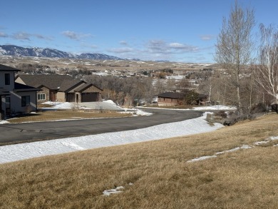 Set in a picturesque location, this lot offers elevated views of on The Powder Horn Golf Club - Mountain in Wyoming - for sale on GolfHomes.com, golf home, golf lot