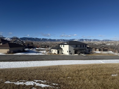 Set in a picturesque location, this lot offers elevated views of on The Powder Horn Golf Club - Mountain in Wyoming - for sale on GolfHomes.com, golf home, golf lot