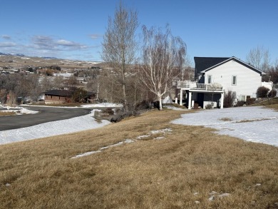 Set in a picturesque location, this lot offers elevated views of on The Powder Horn Golf Club - Mountain in Wyoming - for sale on GolfHomes.com, golf home, golf lot