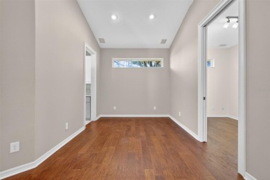 Welcome to this expanded Duke model in the highly desirable 55+ on Monarch At Royal Highlands in Florida - for sale on GolfHomes.com, golf home, golf lot