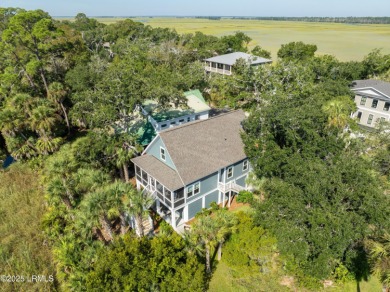 Charming raised beach house built in 2022 is the perfect 2nd on Ocean Creek Golf Course in South Carolina - for sale on GolfHomes.com, golf home, golf lot