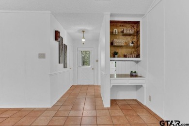 Welcome to this Traditional 3-bedroom, 2-bathroom home nestled on Hide-A-Way Lake Golf Course in Texas - for sale on GolfHomes.com, golf home, golf lot