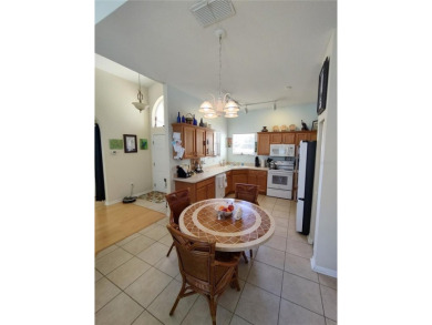 WHAT A RARE FIND!!! This Caneel Bay model home is an example of on Royal Oaks Golf Club in Florida - for sale on GolfHomes.com, golf home, golf lot