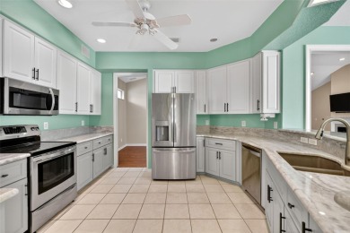 Welcome to this expanded Duke model in the highly desirable 55+ on Monarch At Royal Highlands in Florida - for sale on GolfHomes.com, golf home, golf lot
