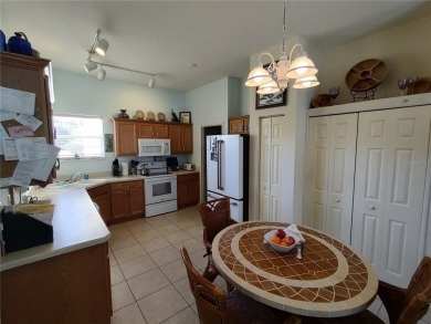 WHAT A RARE FIND!!! This Caneel Bay model home is an example of on Royal Oaks Golf Club in Florida - for sale on GolfHomes.com, golf home, golf lot