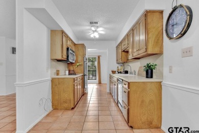 Welcome to this Traditional 3-bedroom, 2-bathroom home nestled on Hide-A-Way Lake Golf Course in Texas - for sale on GolfHomes.com, golf home, golf lot