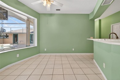 Welcome to this expanded Duke model in the highly desirable 55+ on Monarch At Royal Highlands in Florida - for sale on GolfHomes.com, golf home, golf lot