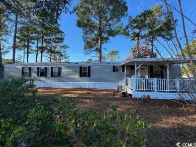 Embrace tranquility and scenic beauty at Crystal Lake! This on Prestwick Country Club in South Carolina - for sale on GolfHomes.com, golf home, golf lot