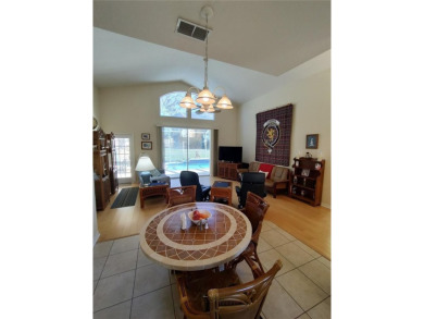 WHAT A RARE FIND!!! This Caneel Bay model home is an example of on Royal Oaks Golf Club in Florida - for sale on GolfHomes.com, golf home, golf lot