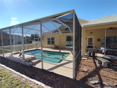 WHAT A RARE FIND!!! This Caneel Bay model home is an example of on Royal Oaks Golf Club in Florida - for sale on GolfHomes.com, golf home, golf lot