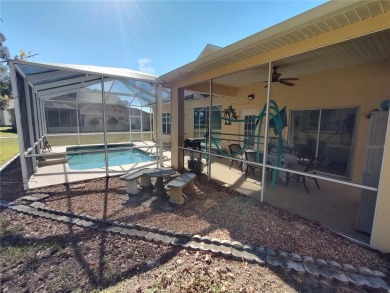 WHAT A RARE FIND!!! This Caneel Bay model home is an example of on Royal Oaks Golf Club in Florida - for sale on GolfHomes.com, golf home, golf lot