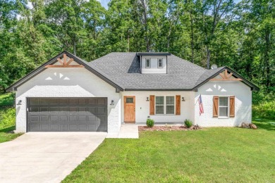 Modern Home in a Resort-Style Community Near Downtown Hot on Diamondhead Golf and Country Club in Arkansas - for sale on GolfHomes.com, golf home, golf lot