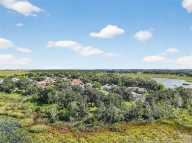 Welcome to this expanded Duke model in the highly desirable 55+ on Monarch At Royal Highlands in Florida - for sale on GolfHomes.com, golf home, golf lot