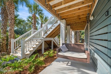 Charming raised beach house built in 2022 is the perfect 2nd on Ocean Creek Golf Course in South Carolina - for sale on GolfHomes.com, golf home, golf lot