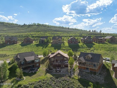 Charming mountain retreat located in the Granby Ranch on Headwaters Golf Course At Granby Ranch in Colorado - for sale on GolfHomes.com, golf home, golf lot