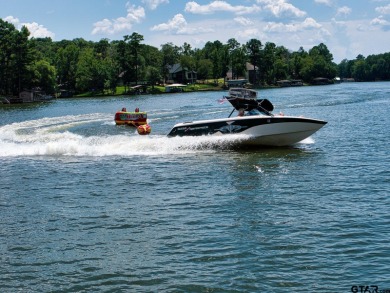 Welcome to this Traditional 3-bedroom, 2-bathroom home nestled on Hide-A-Way Lake Golf Course in Texas - for sale on GolfHomes.com, golf home, golf lot
