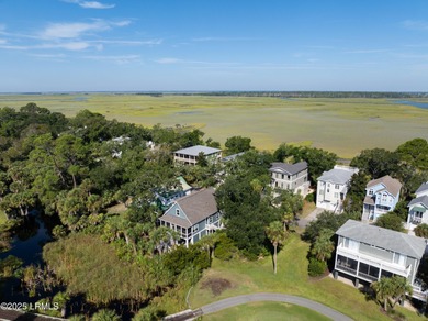 Charming raised beach house built in 2022 is the perfect 2nd on Ocean Creek Golf Course in South Carolina - for sale on GolfHomes.com, golf home, golf lot
