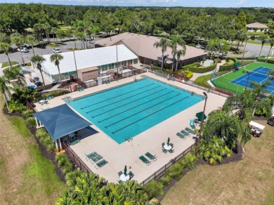 Welcome to this expanded Duke model in the highly desirable 55+ on Monarch At Royal Highlands in Florida - for sale on GolfHomes.com, golf home, golf lot