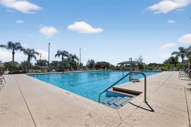 Welcome to this expanded Duke model in the highly desirable 55+ on Monarch At Royal Highlands in Florida - for sale on GolfHomes.com, golf home, golf lot