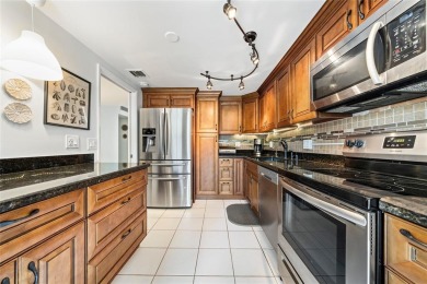 Escape to the Palm Aire lifestyle in this spacious 2BR/2BA condo on Palm-Aire Country Club and Resort - The Oaks in Florida - for sale on GolfHomes.com, golf home, golf lot