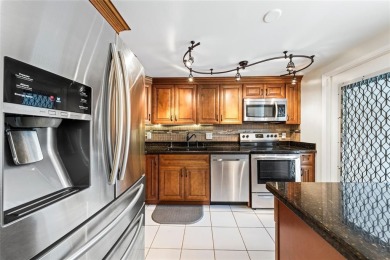Escape to the Palm Aire lifestyle in this spacious 2BR/2BA condo on Palm-Aire Country Club and Resort - The Oaks in Florida - for sale on GolfHomes.com, golf home, golf lot