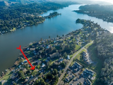 Charming Lake View Lot with New Septic Installed.  Located in on Chinook Winds Golf Resort in Oregon - for sale on GolfHomes.com, golf home, golf lot