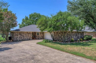 Tucked away on a quiet road, this well-laid out home on Lake on Lake Kiowa Golf Course in Texas - for sale on GolfHomes.com, golf home, golf lot