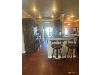 This stunning 4 bedroom, 2 bath home with a sparkling pool is on Gatesville Country Club in Texas - for sale on GolfHomes.com, golf home, golf lot