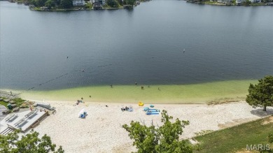 Lakefront Living at Its Finest! Nestled on a picturesque 1/2 on Raintree Country Club in Missouri - for sale on GolfHomes.com, golf home, golf lot