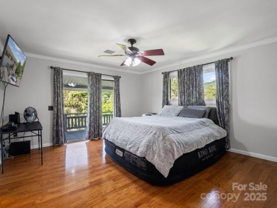 Located just minutes from the Blue Ridge Parkway, sits an on Grassy Creek Golf and Country Club in North Carolina - for sale on GolfHomes.com, golf home, golf lot