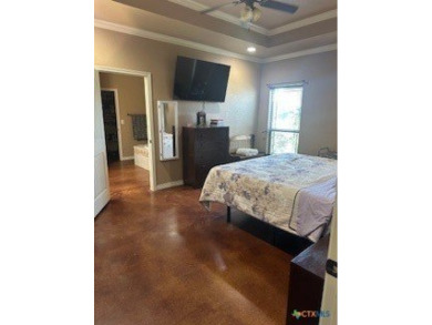 This stunning 4 bedroom, 2 bath home with a sparkling pool is on Gatesville Country Club in Texas - for sale on GolfHomes.com, golf home, golf lot
