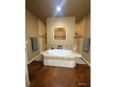 This stunning 4 bedroom, 2 bath home with a sparkling pool is on Gatesville Country Club in Texas - for sale on GolfHomes.com, golf home, golf lot