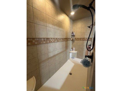 This stunning 4 bedroom, 2 bath home with a sparkling pool is on Gatesville Country Club in Texas - for sale on GolfHomes.com, golf home, golf lot