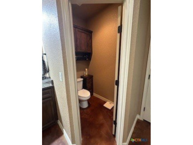 This stunning 4 bedroom, 2 bath home with a sparkling pool is on Gatesville Country Club in Texas - for sale on GolfHomes.com, golf home, golf lot