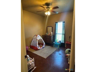 This stunning 4 bedroom, 2 bath home with a sparkling pool is on Gatesville Country Club in Texas - for sale on GolfHomes.com, golf home, golf lot