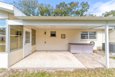 A must see!! Nicely decorated villa with many extras. This on On Top of the World Golf Course in Florida - for sale on GolfHomes.com, golf home, golf lot